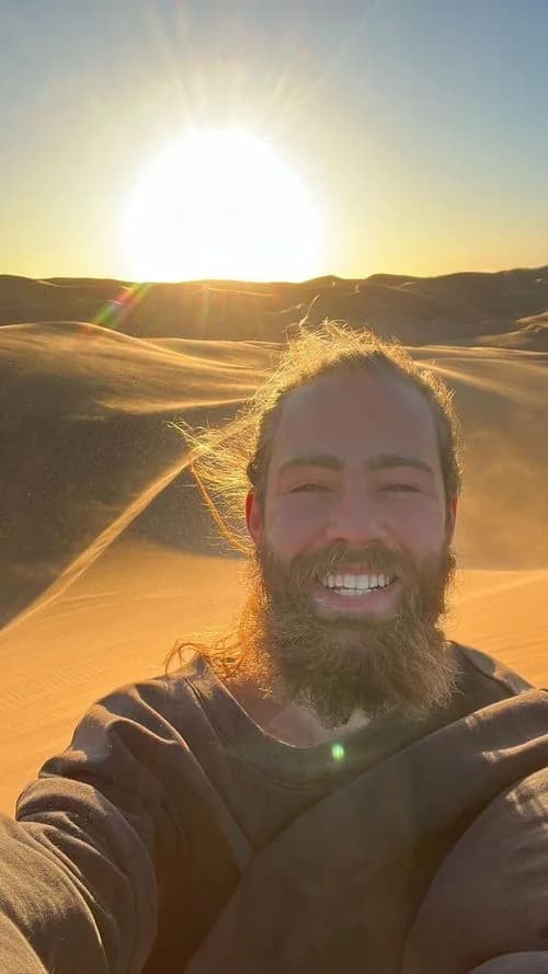 Jaret Dreschel smiling in a desert landscape